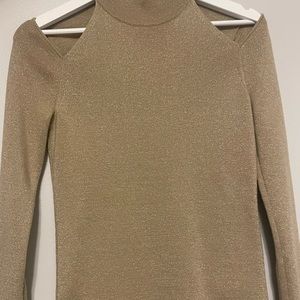 Gold MK sweater.